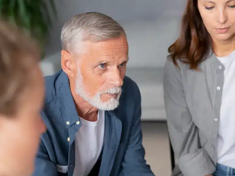 senior-man-and-woman-listening-attentively-in-a-mental-health-support-group